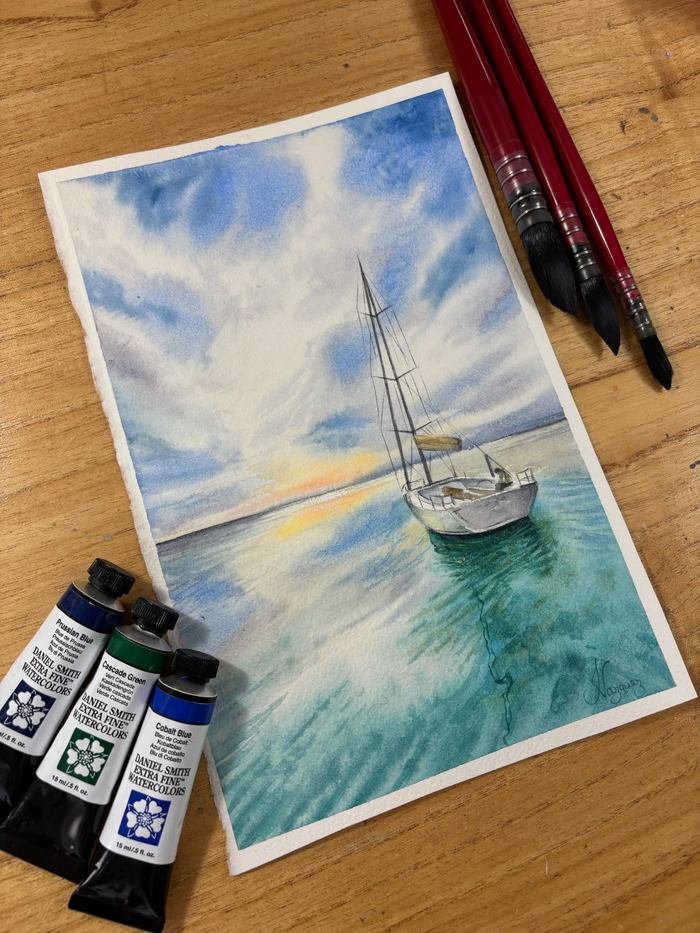 Paisaje marítimo en acuarela sobre papel: un velero sobre el mar turquesa